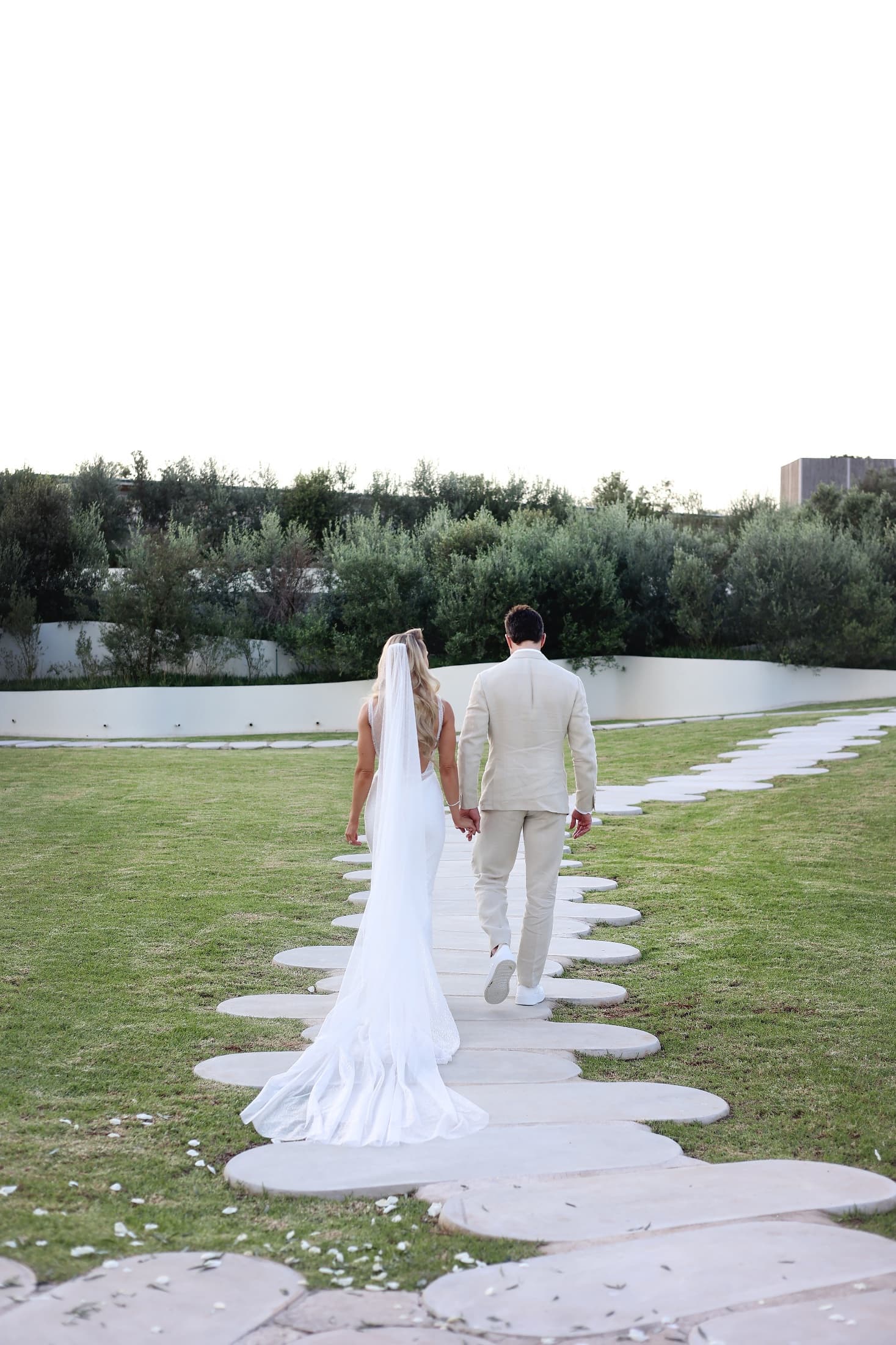 Guests crossing the circular stone pads